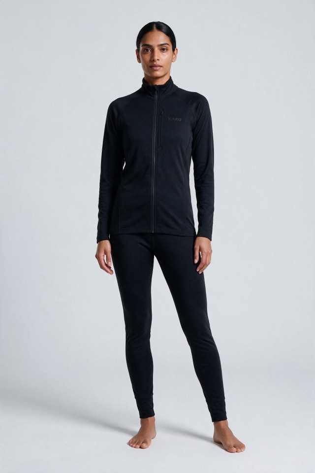 Kaska Long John in night black, worn by a model, studio product shot on a seamless neutral ground