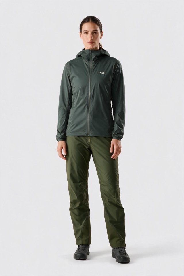 Padjelanta Pant in deep moss, worn by a model, studio product shot on a seamless neutral ground