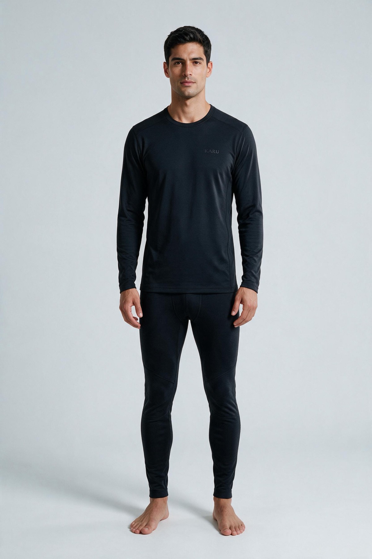 Kaska Long John in night black, worn by a model, studio product shot on a seamless neutral ground