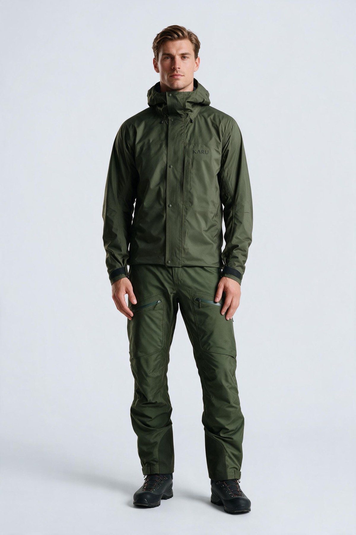 Padjelanta Pant in deep moss, worn by a model, studio product shot on a seamless neutral ground